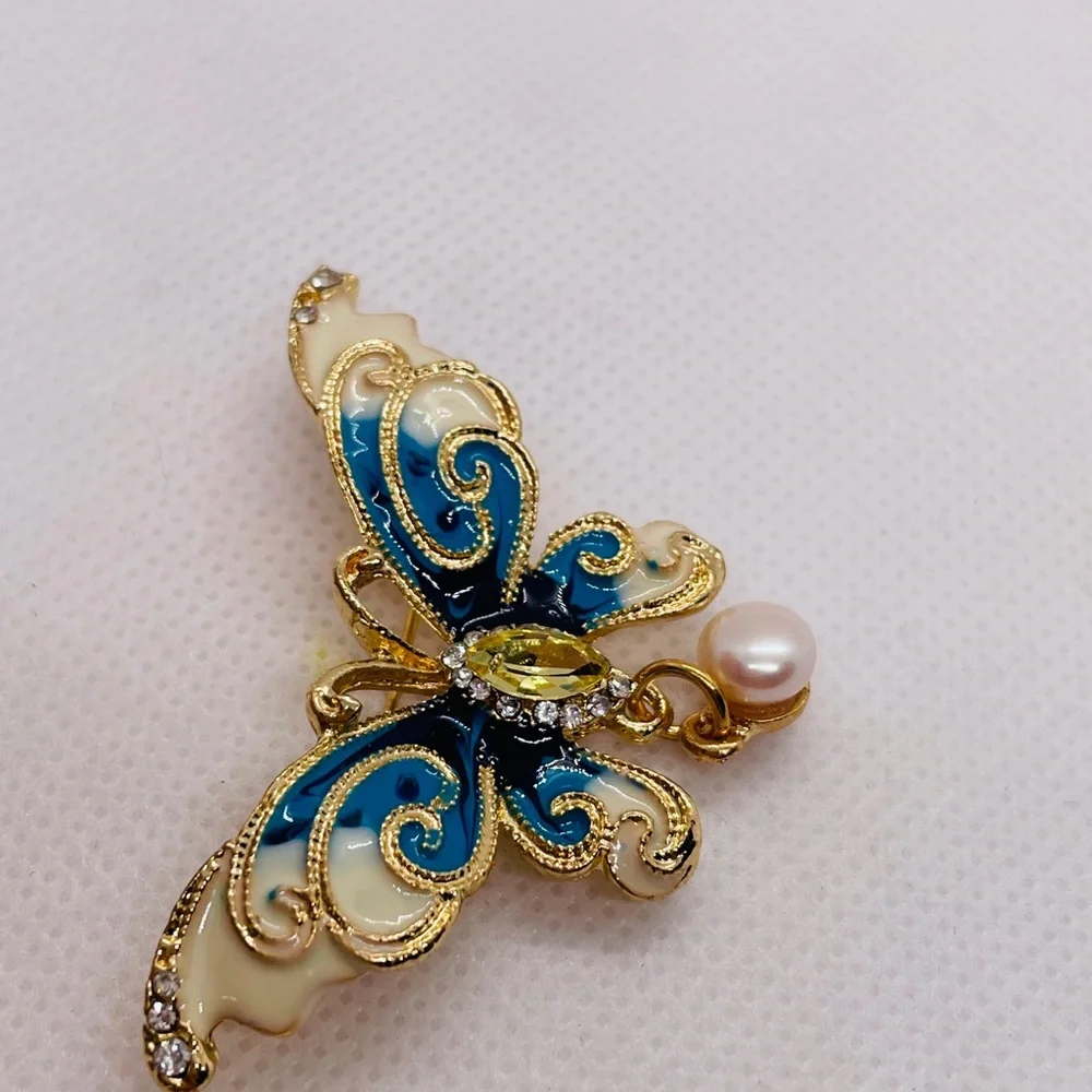 Elegant Gold and Blue Butterfly Brooch